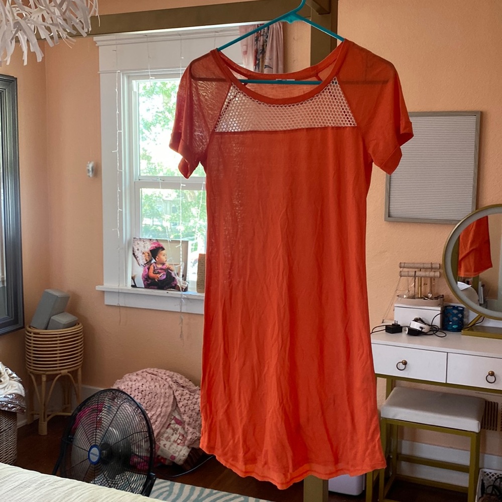 Oarnge dress with white net at top